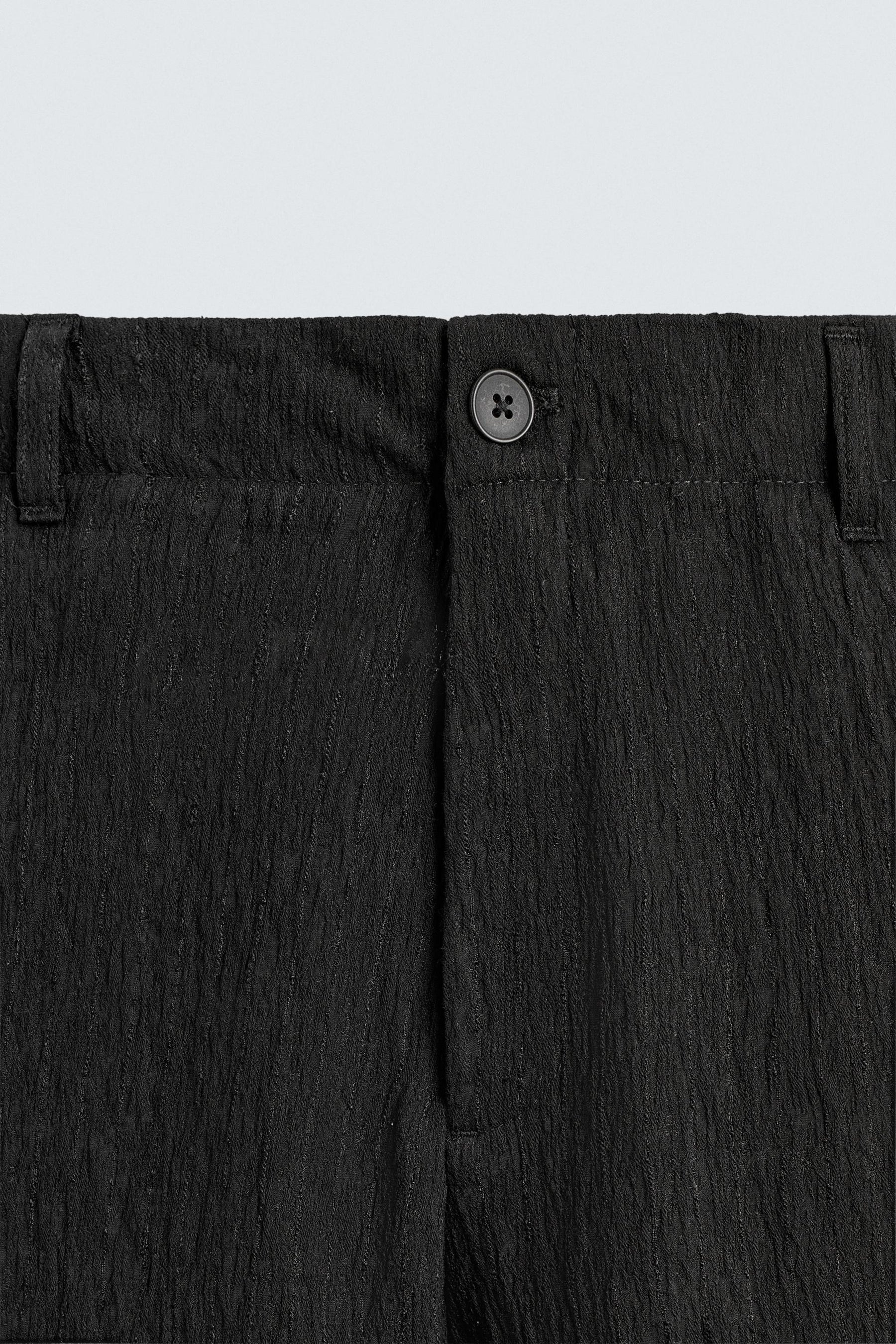 REGULAR FIT TROUSERS WITH IRREGULAR TEXTURE - Image 9