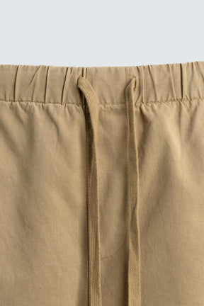 LYOCELL-COTTON RELAXED FIT BERMUDA SHORTS - Image 9