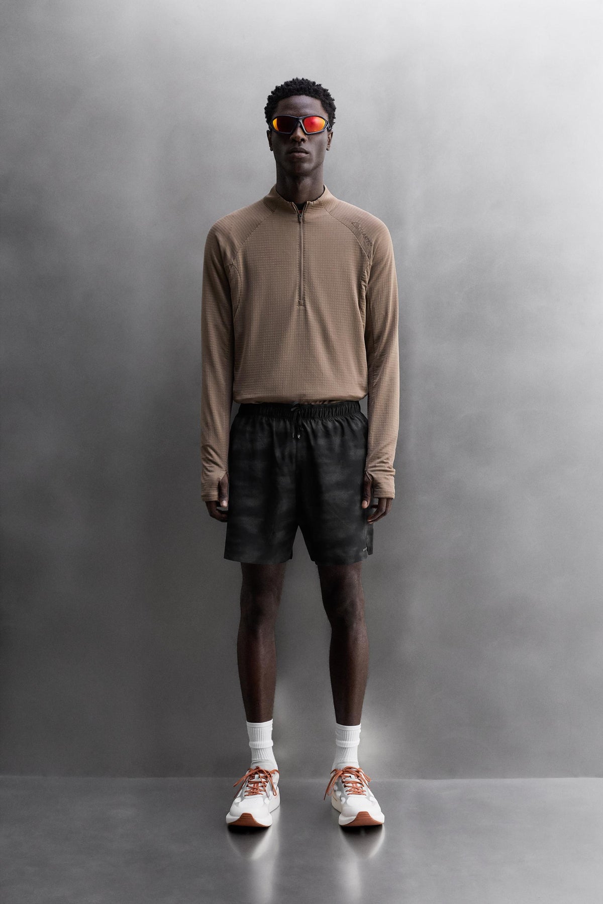 PERFORATED RUNNING SHORTS - Image 1