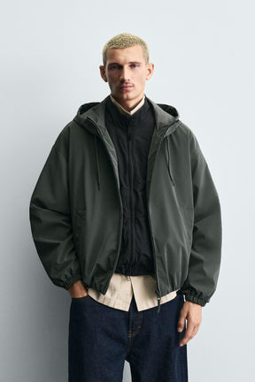 TECHNICAL HOODED JACKET - Image 2