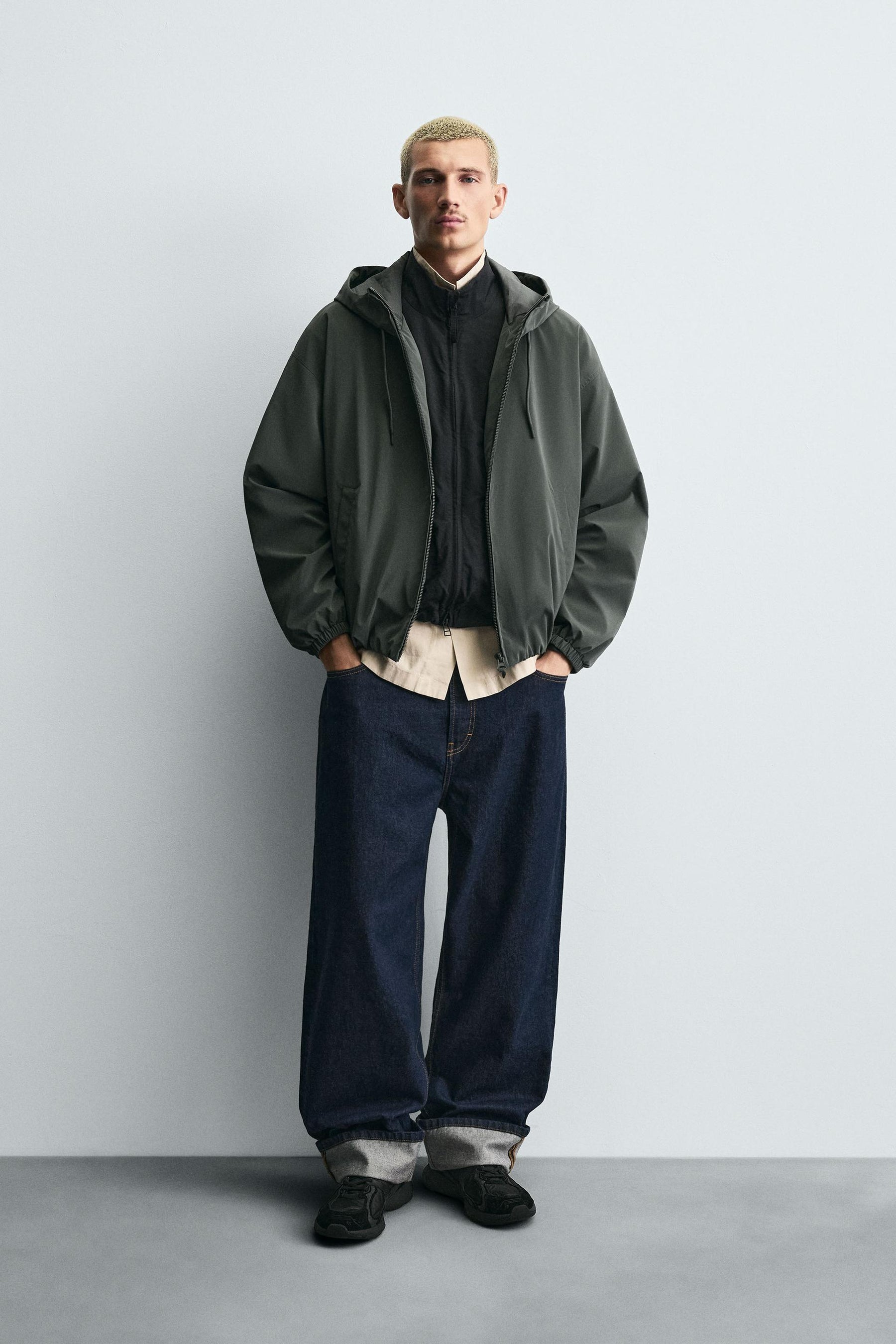 TECHNICAL HOODED JACKET - Image 1