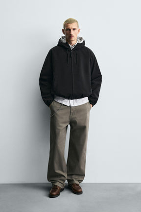 TECHNICAL HOODED JACKET - Image 1