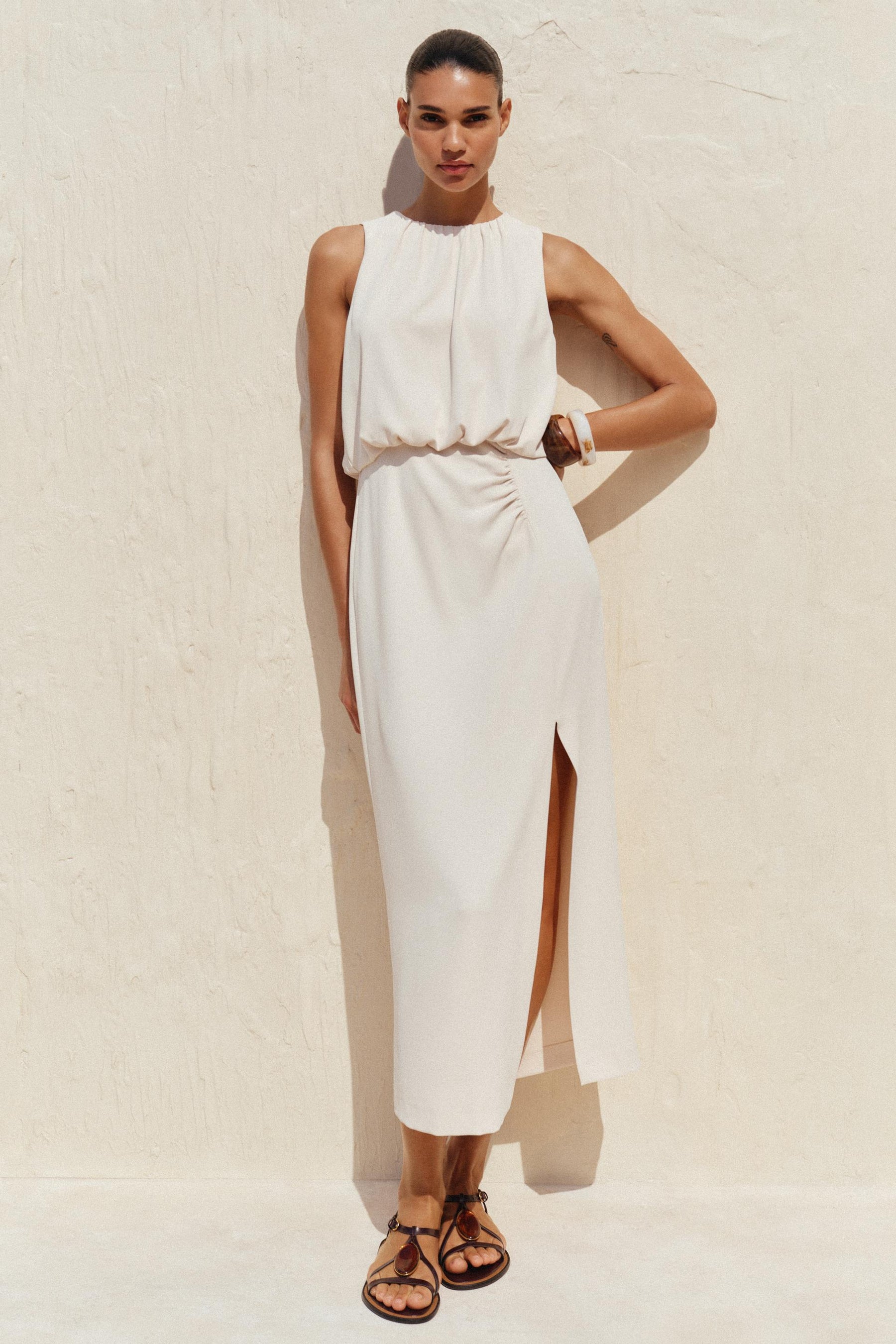 METAL APPLIQUÉ SANDALS