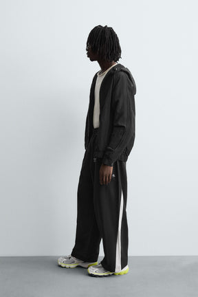 TECHNICAL TROUSERS WITH TAPING - Image 4