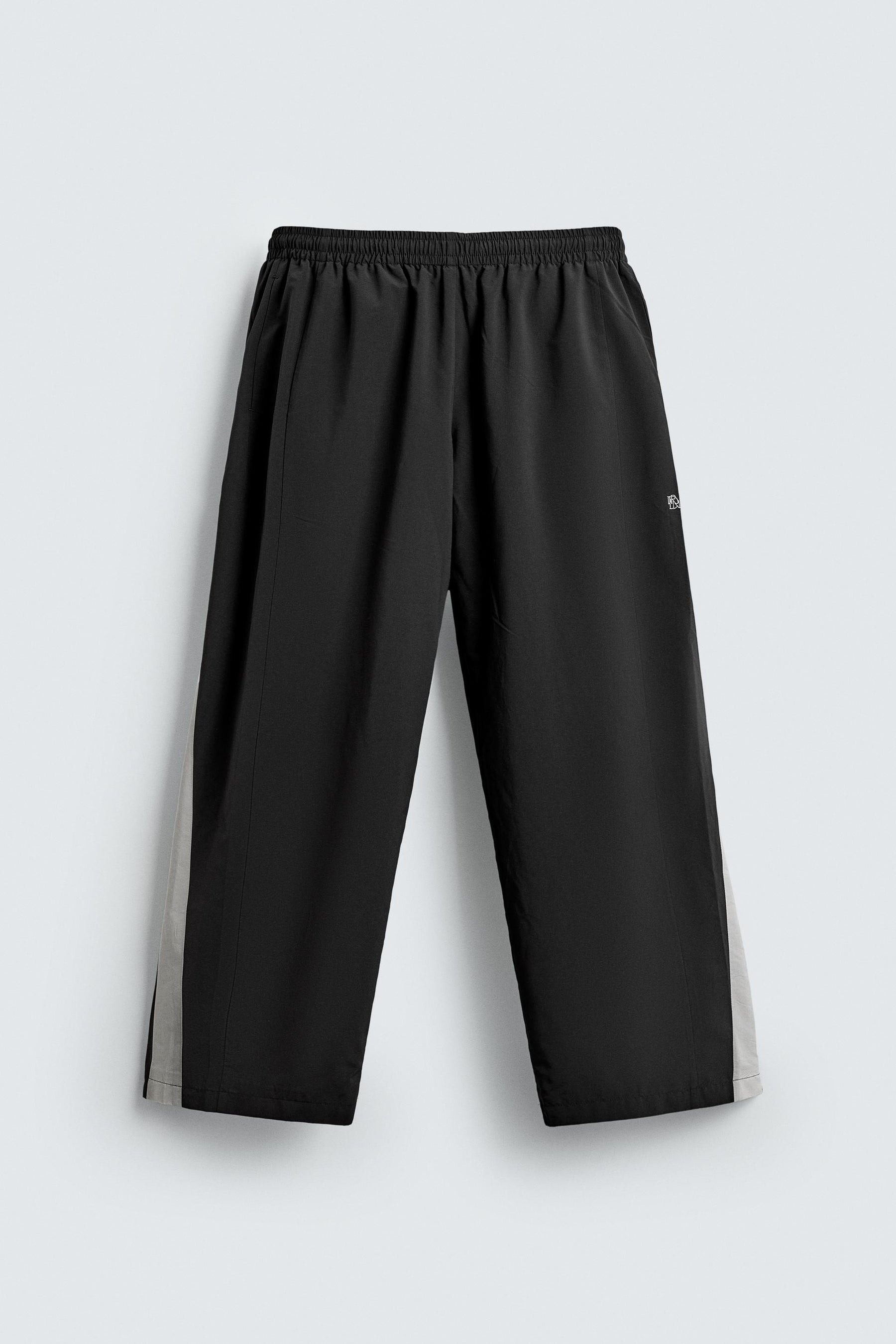 TECHNICAL TROUSERS WITH TAPING - Image 7