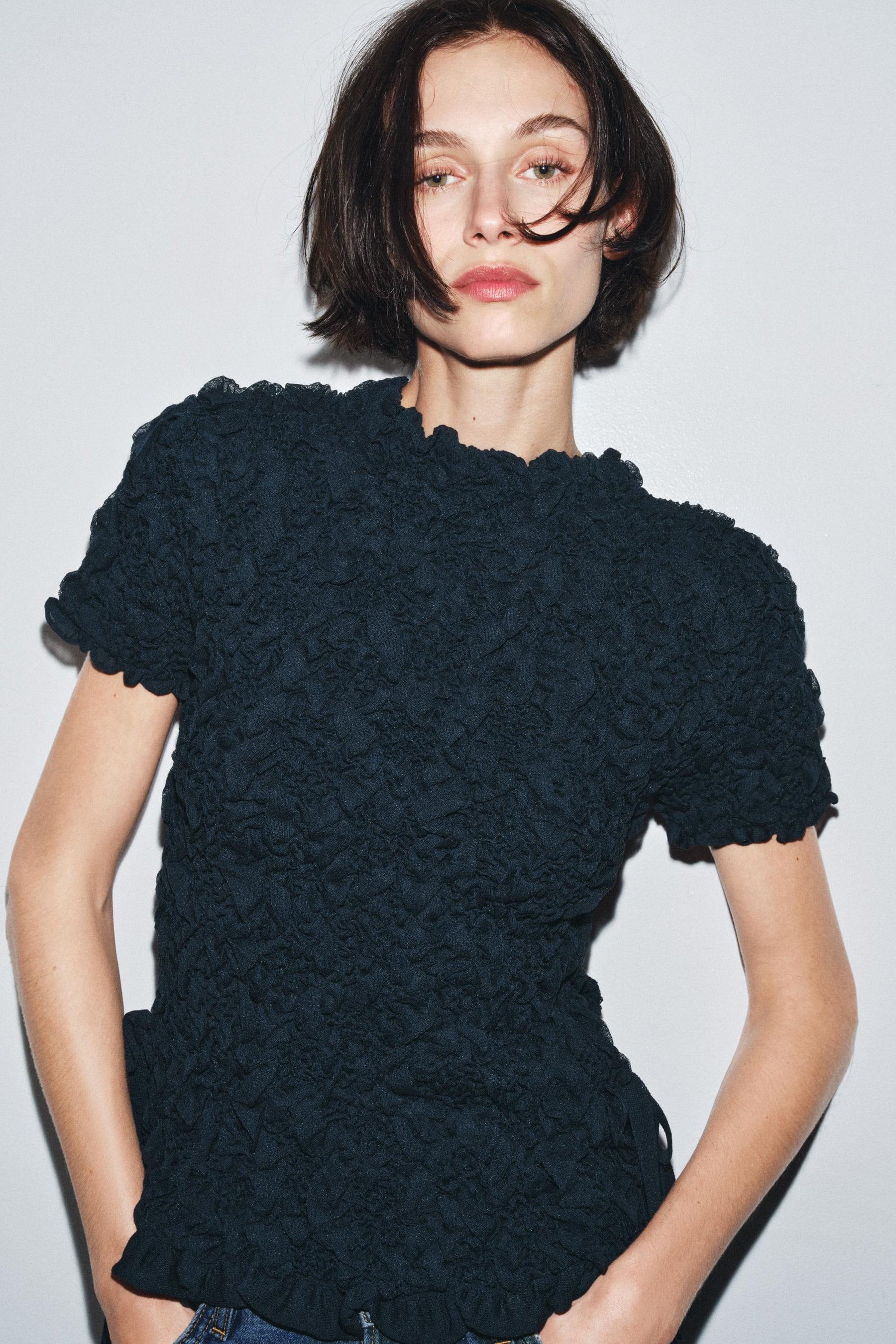 TEXTURED SHORT SLEEVE JUMPER WITH BOWS - Image 1