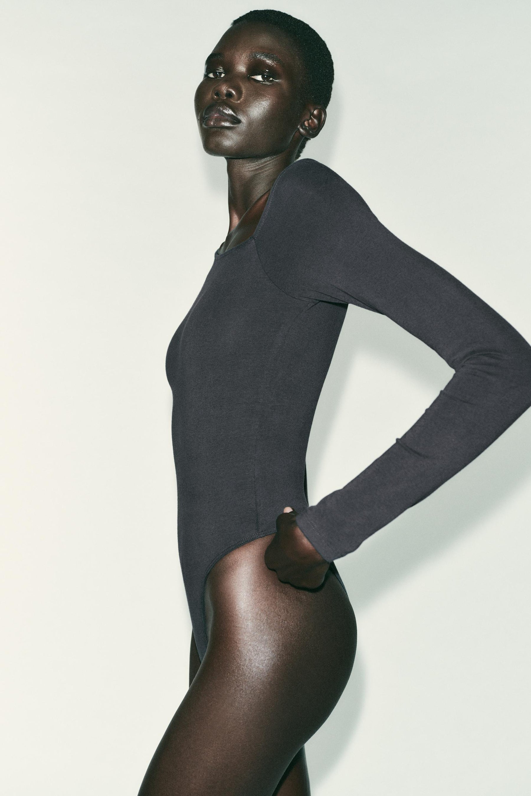 ASYMMETRIC LONG SLEEVE BODYSUIT