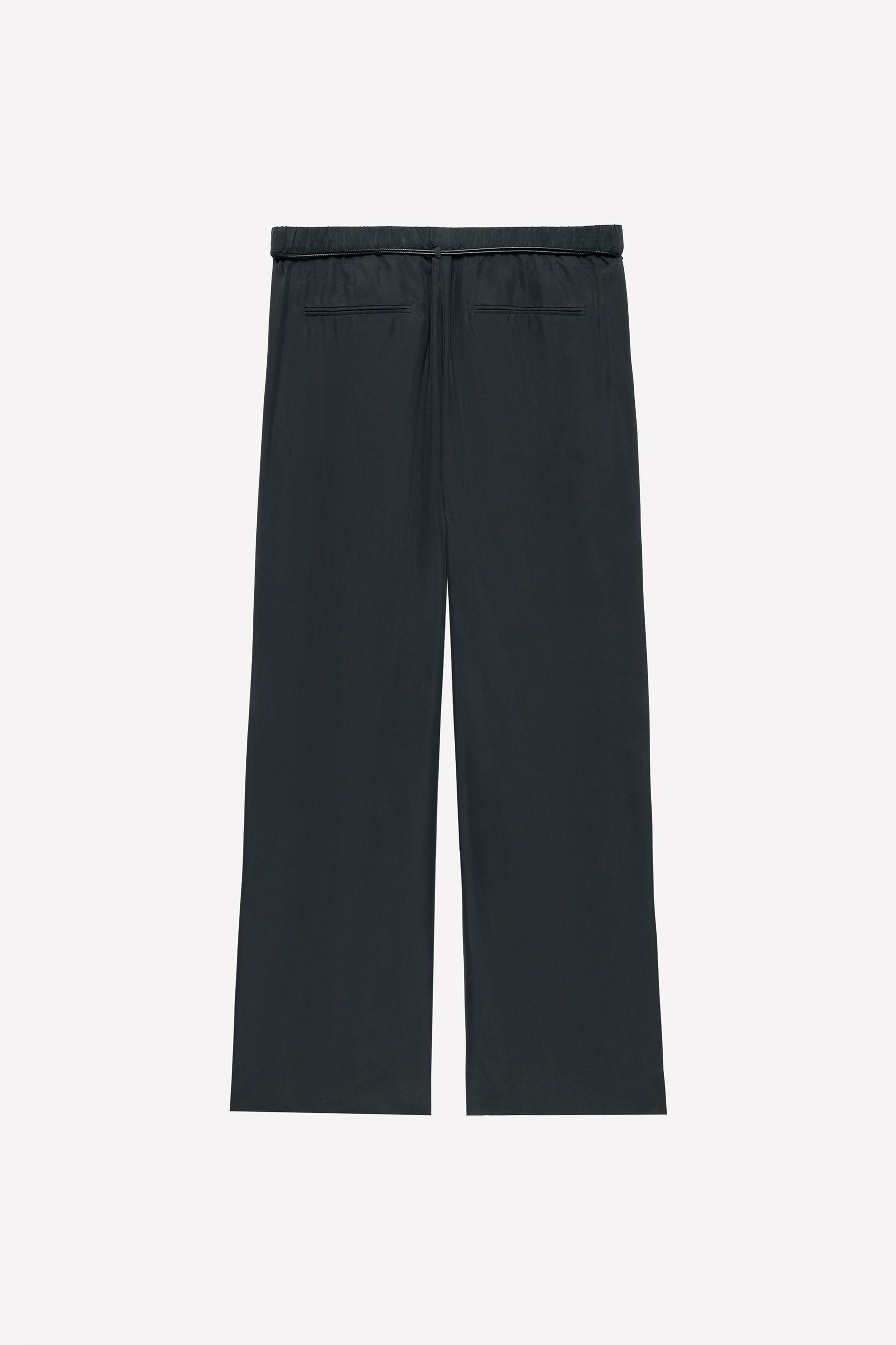 Silk trousers with belt.