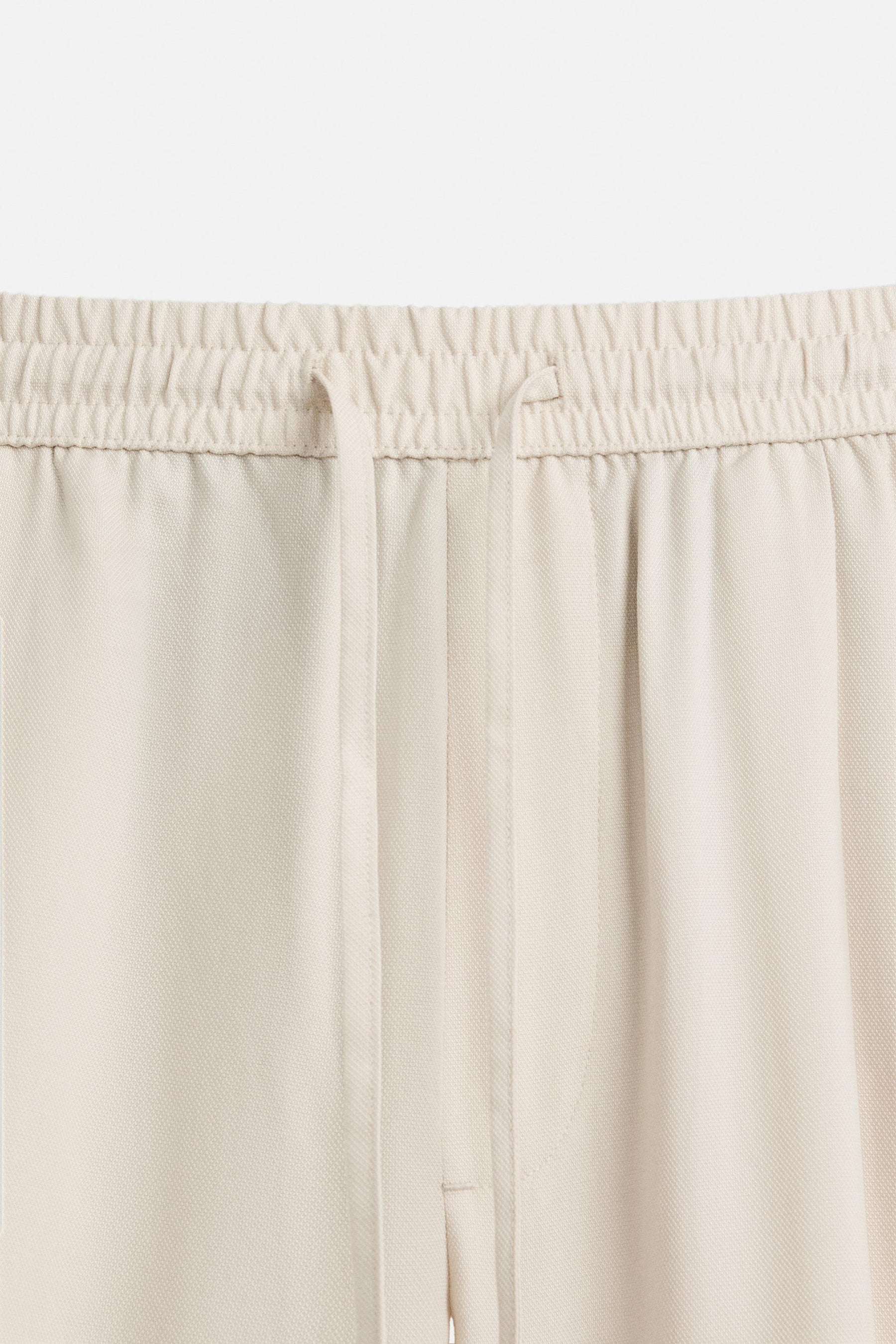 RELAXED FIT LYOCELL TROUSERS - Image 9