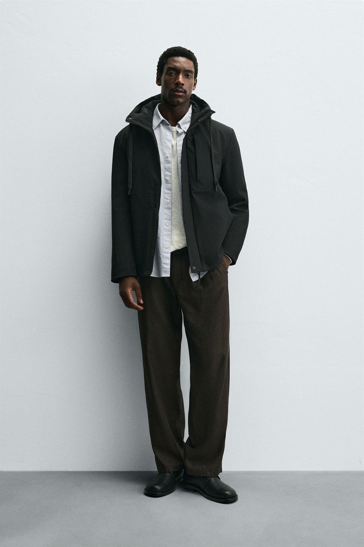 TECHNICAL HOODED JACKET - Image 1