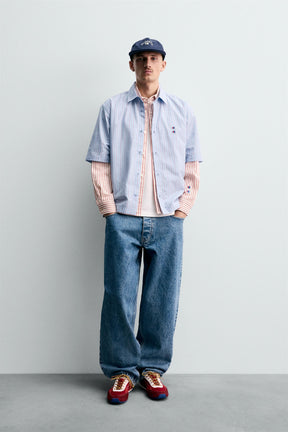 STRIPED SHIRT WITH PATCHES CHAMPION ® X - Image 1