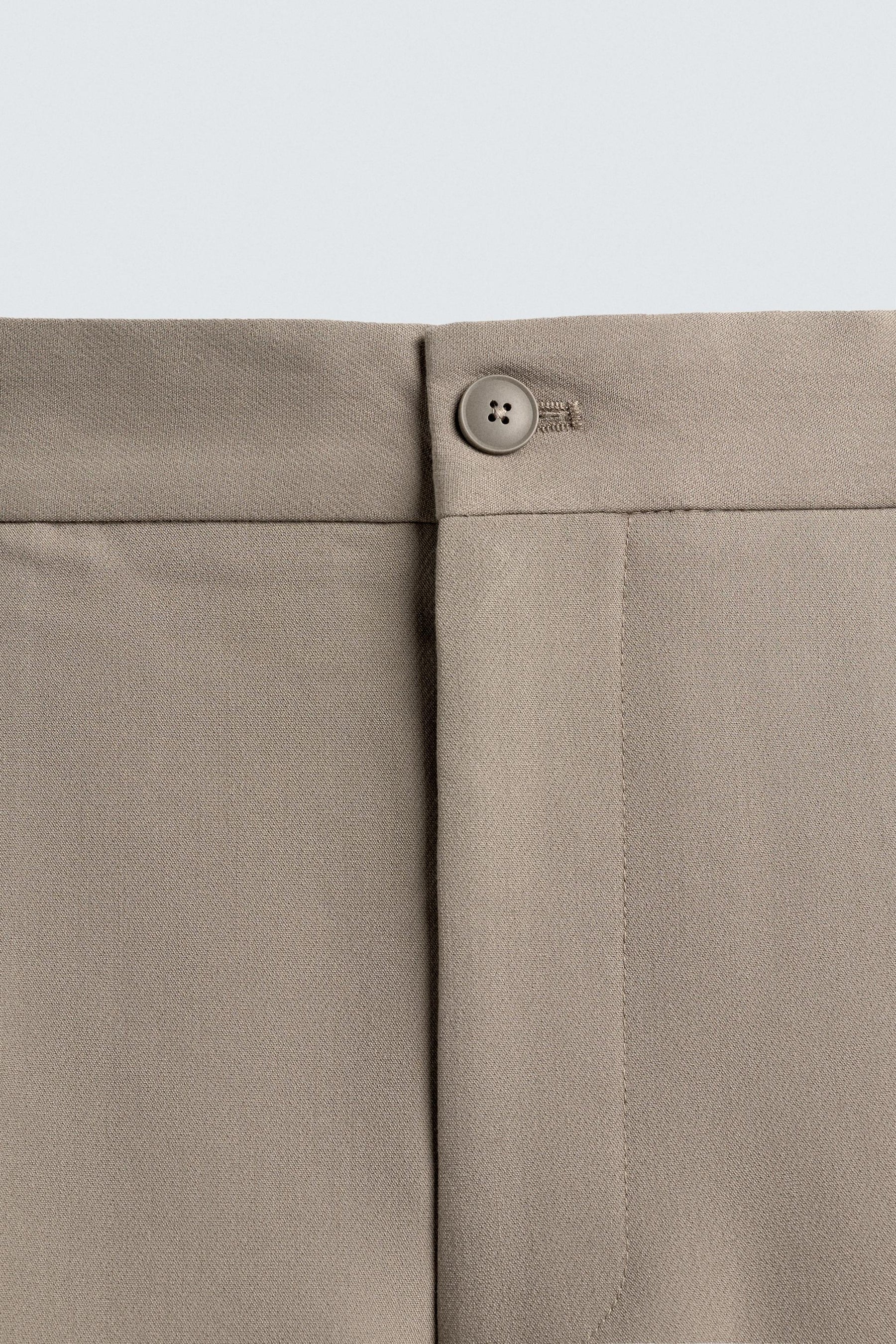 RELAXED FIT PLEATED TROUSERS - Image 9