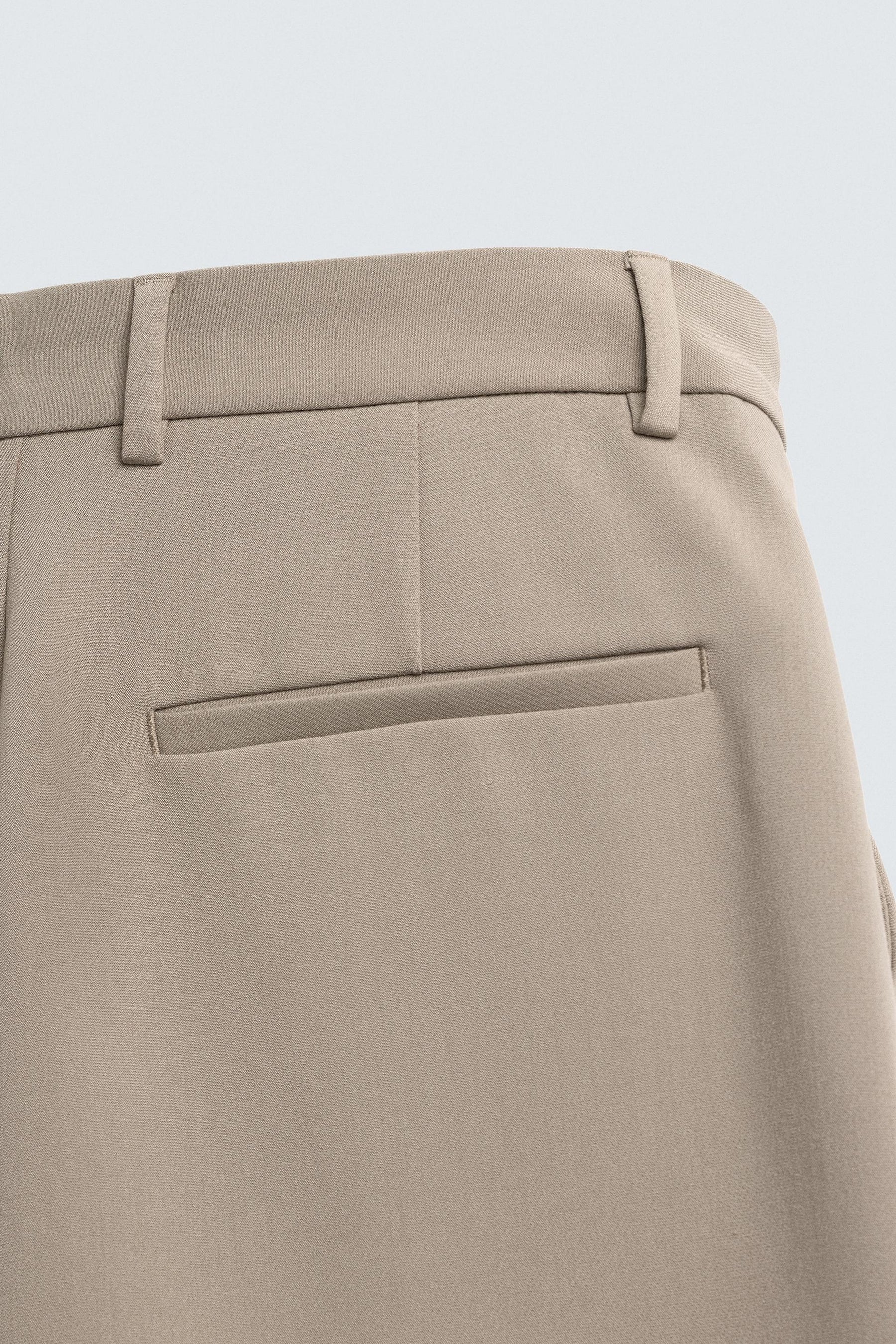 RELAXED FIT PLEATED TROUSERS - Image 10