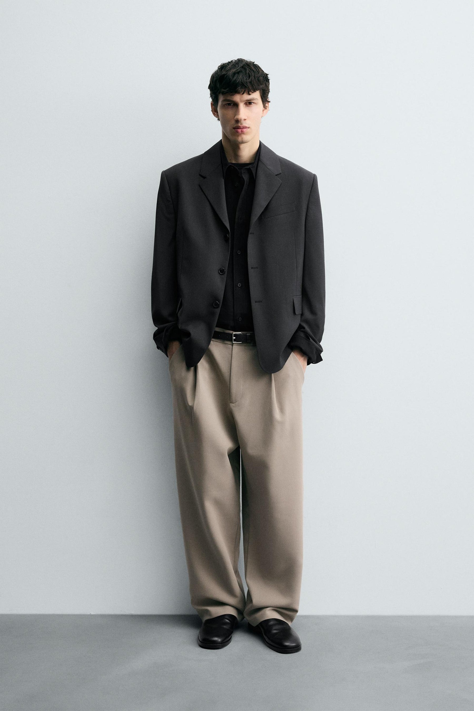RELAXED FIT PLEATED TROUSERS - Image 1