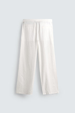 TEXTURED RELAXED FIT TROUSERS - Image 7