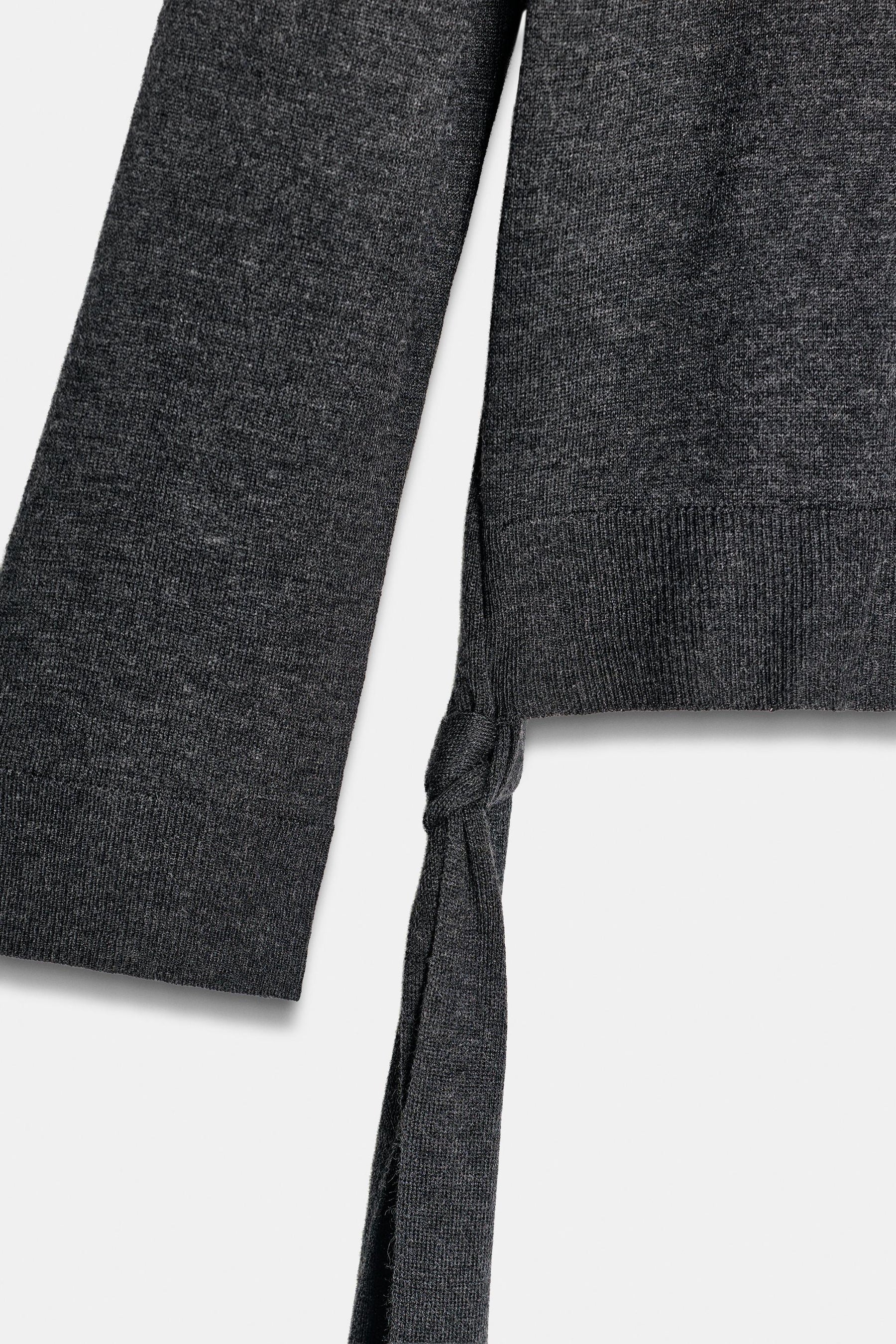 KNIT JUMPER WITH STRAPS