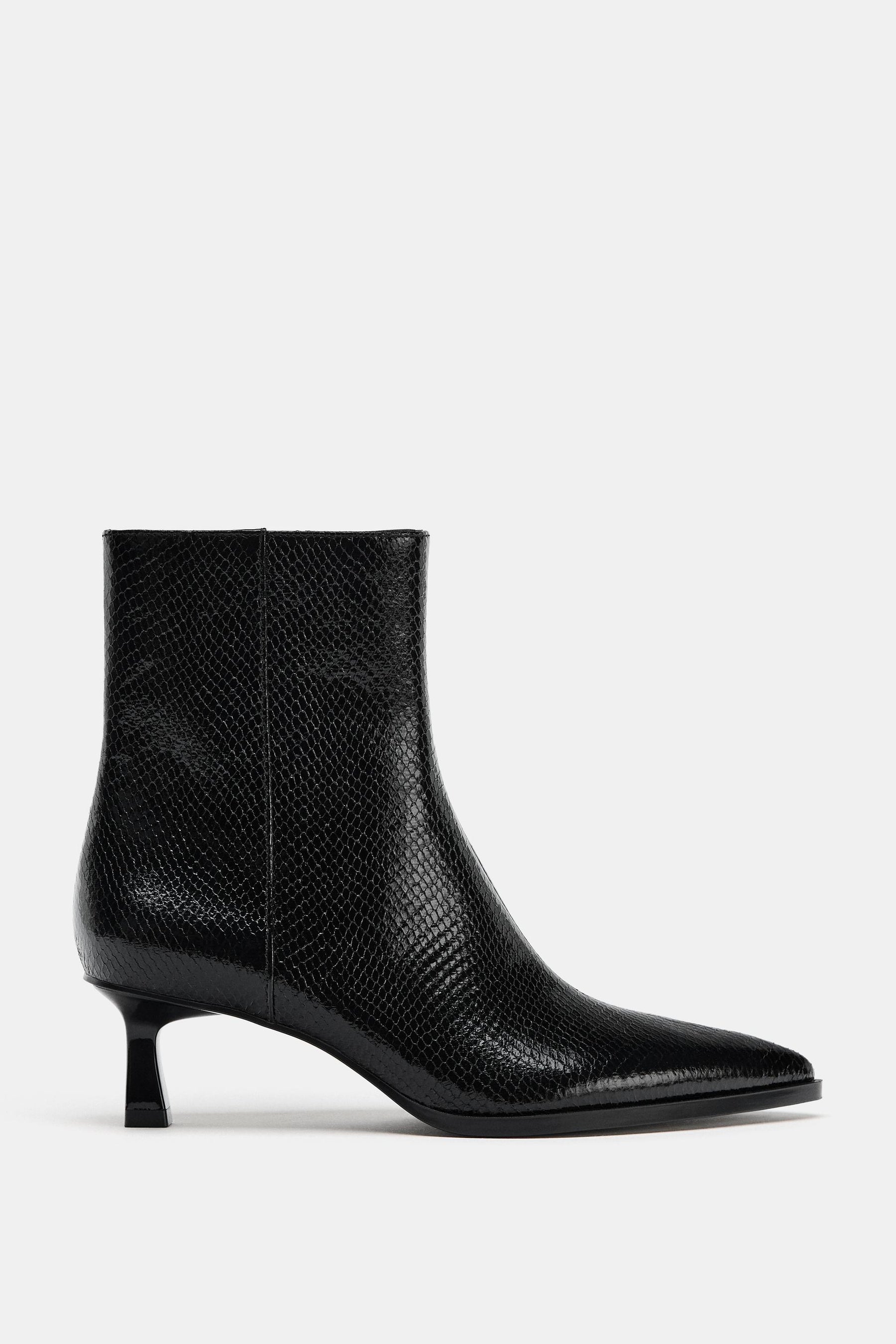 EMBOSSED ANKLE BOOTS