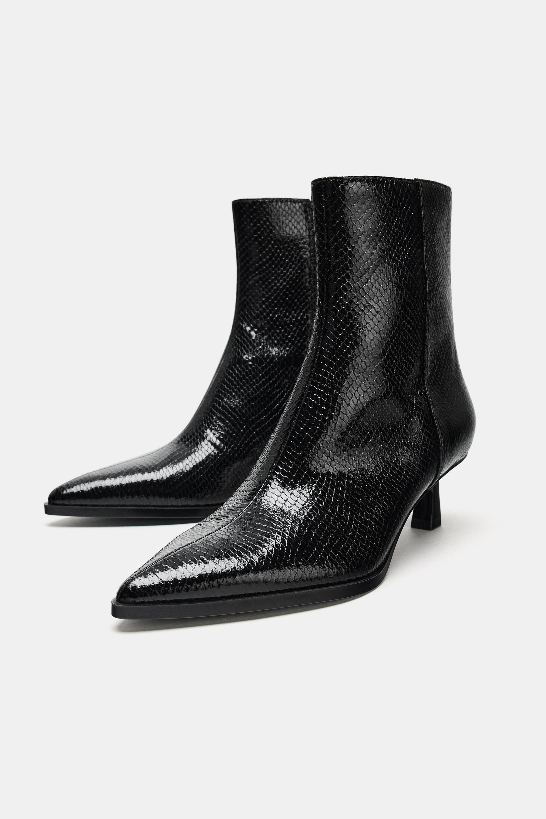 EMBOSSED ANKLE BOOTS