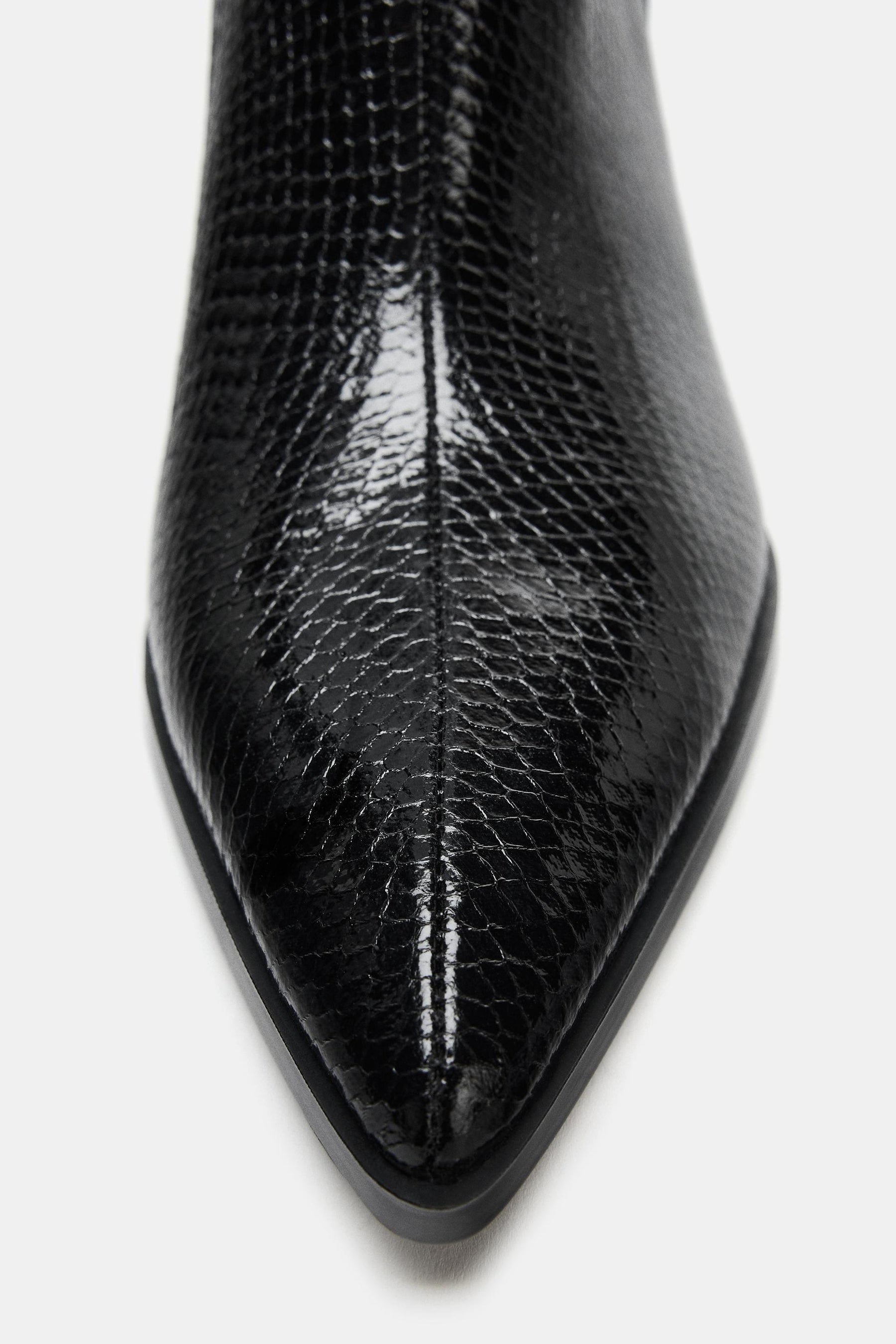 EMBOSSED ANKLE BOOTS